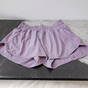 Lululemon's woman size 10 workout shorts with side zipper and drawstring